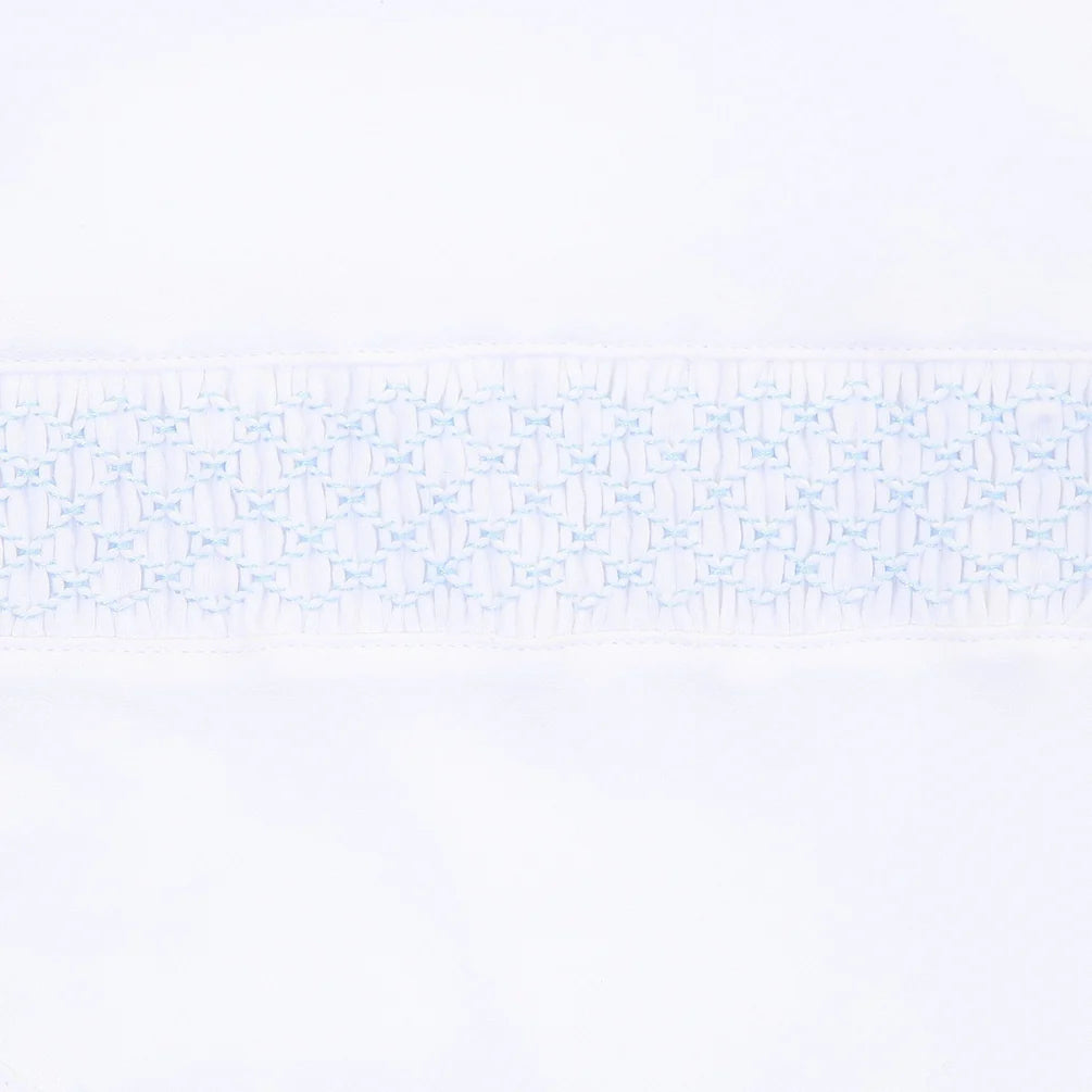 Smocked White Footie with Blue Trim